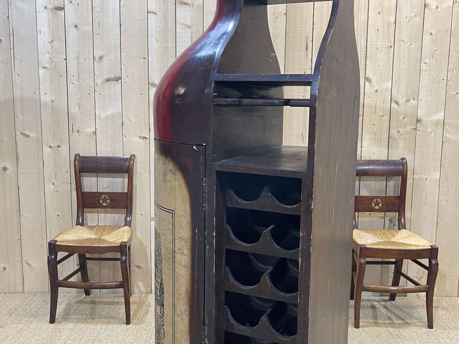 Advertising bar furniture in the shape of a giant wine bottle 90s