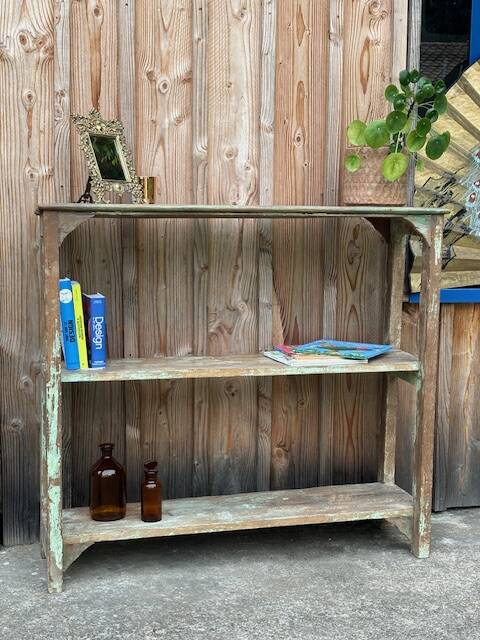 Teak shelves with a green patina