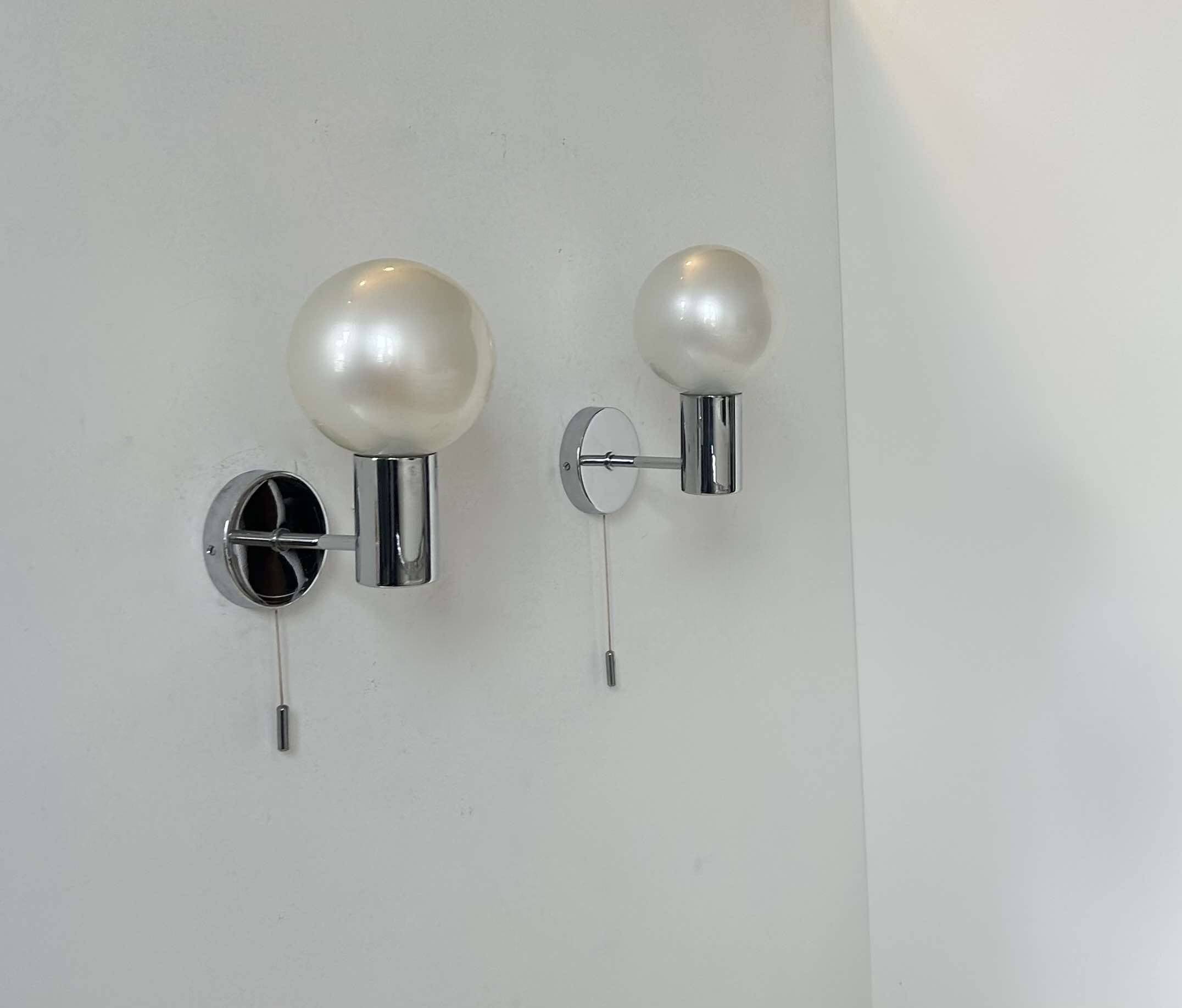 Pair of vintage wall lights, chrome and glass, Germany 1970
