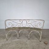 Beautiful curved garden bench from the late 19th century in iron.