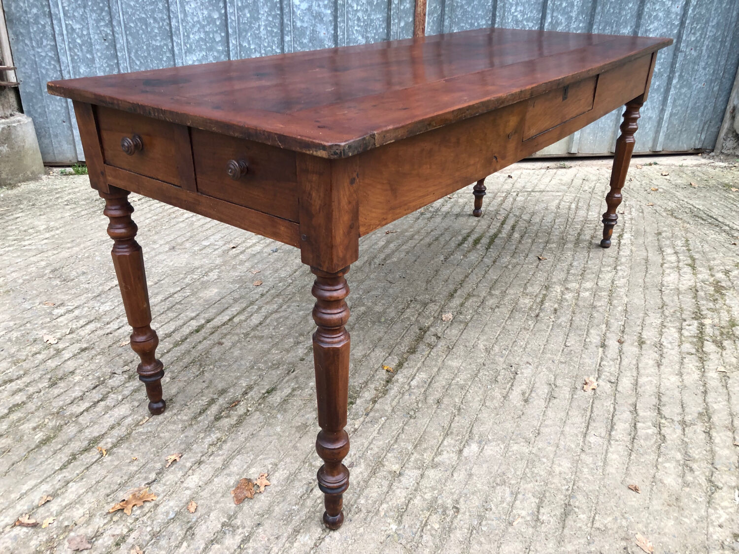 Antique farmhouse table in solid cherry wood with 4 drawers