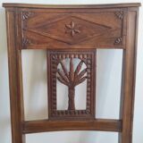 Armchair, low carved chair from the 19th century - decorated with wheat ears.