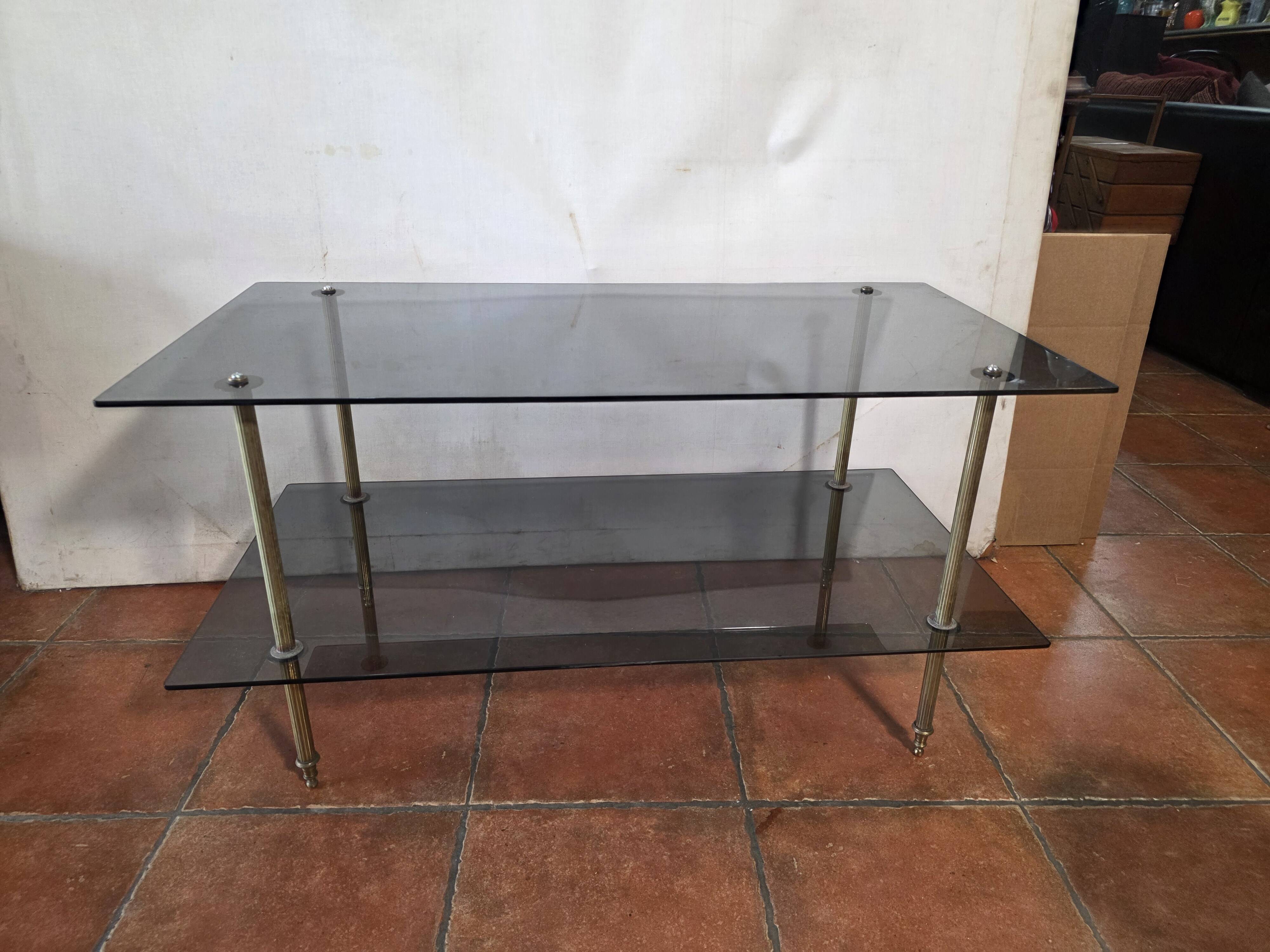 Smoked glass and brass coffee table from the 1970s.