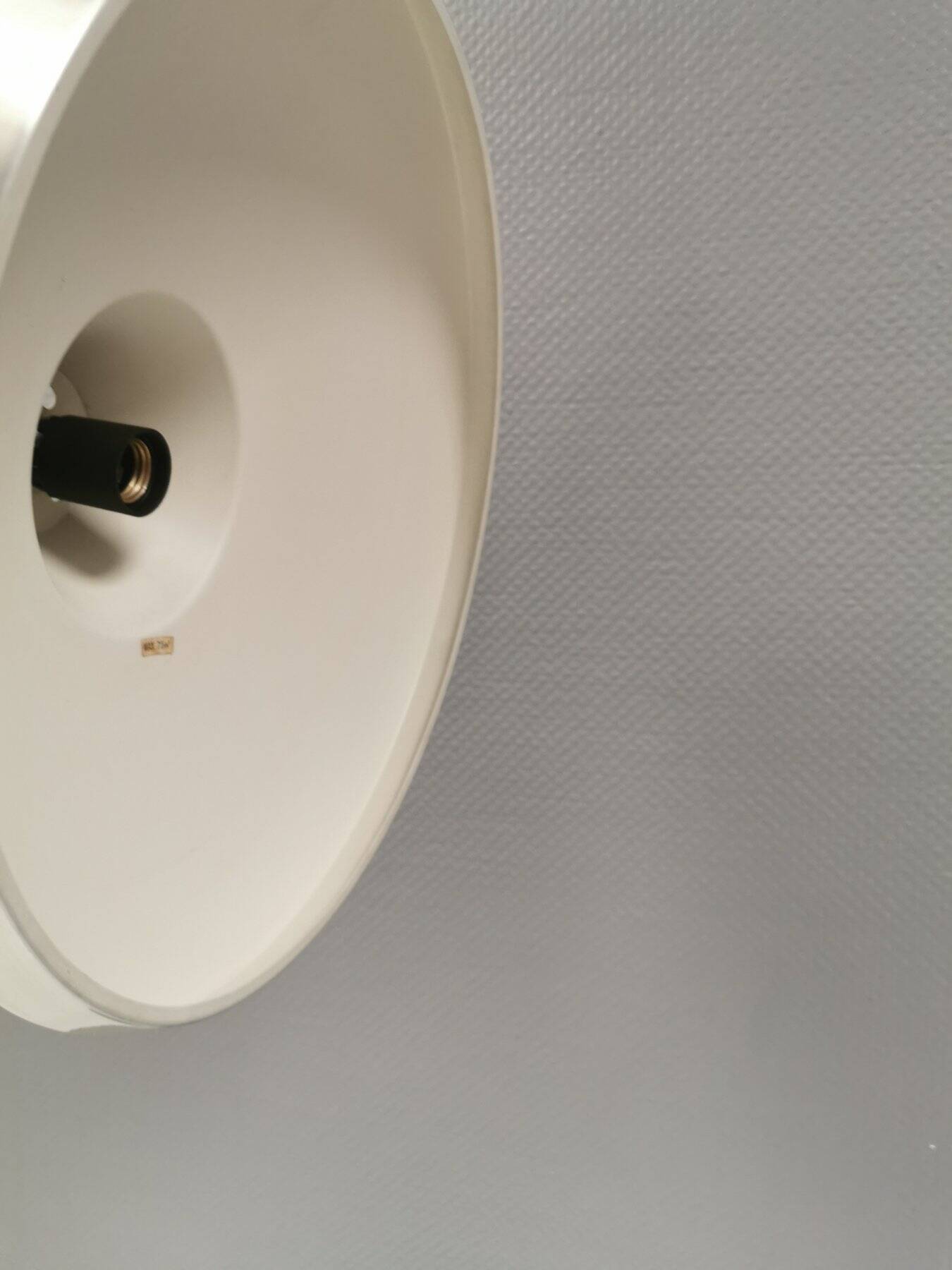 Slim silver-colored hanging lamp with a large diameter. Denmark 1980s