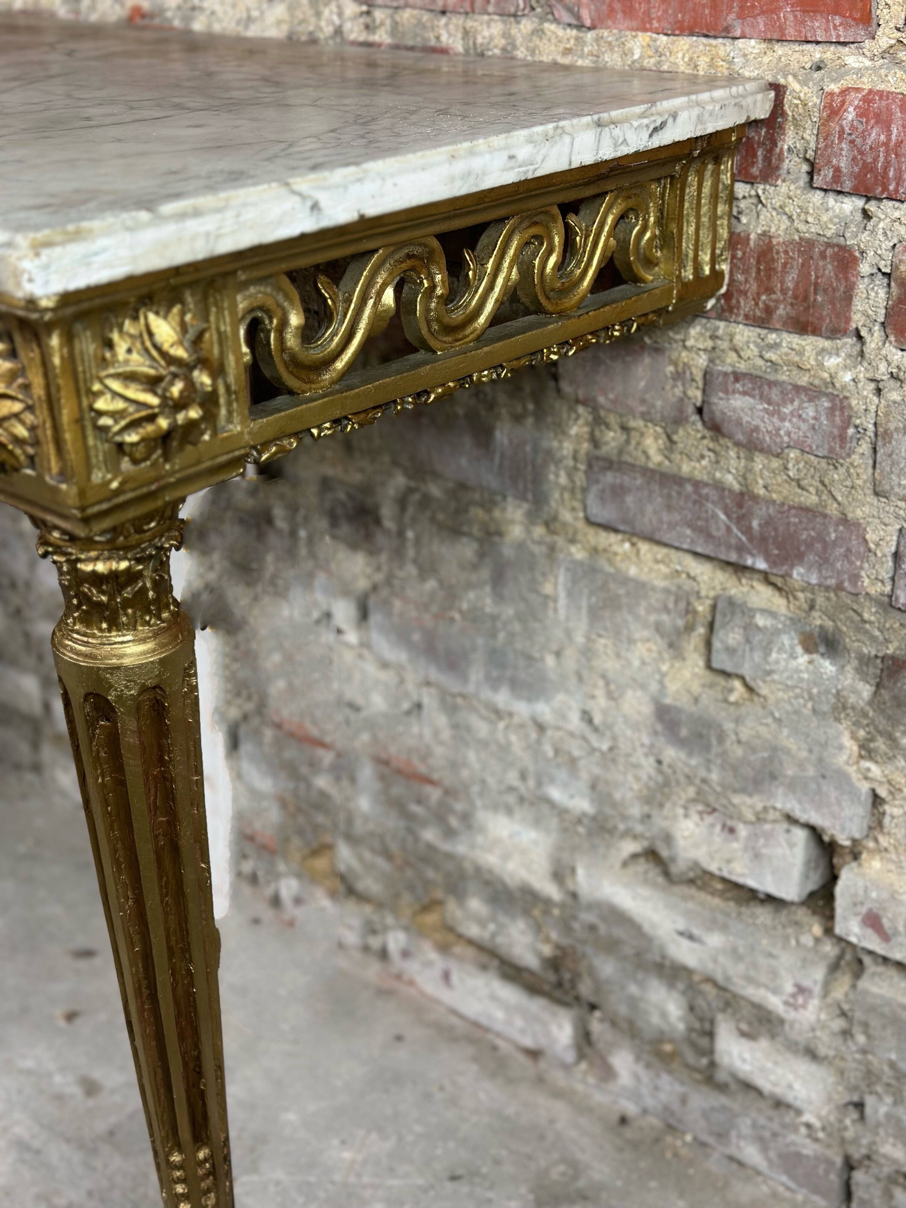 Louis XVI style console in carved wood eighteenth