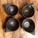 Black enameled ceramic service.