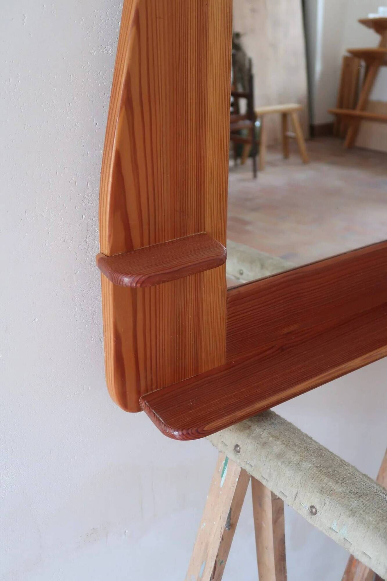 Wall mirror with a solid pine frame, integrated shelf.