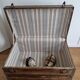 Large-scale marine style decorative wooden trunk with interior upholstery