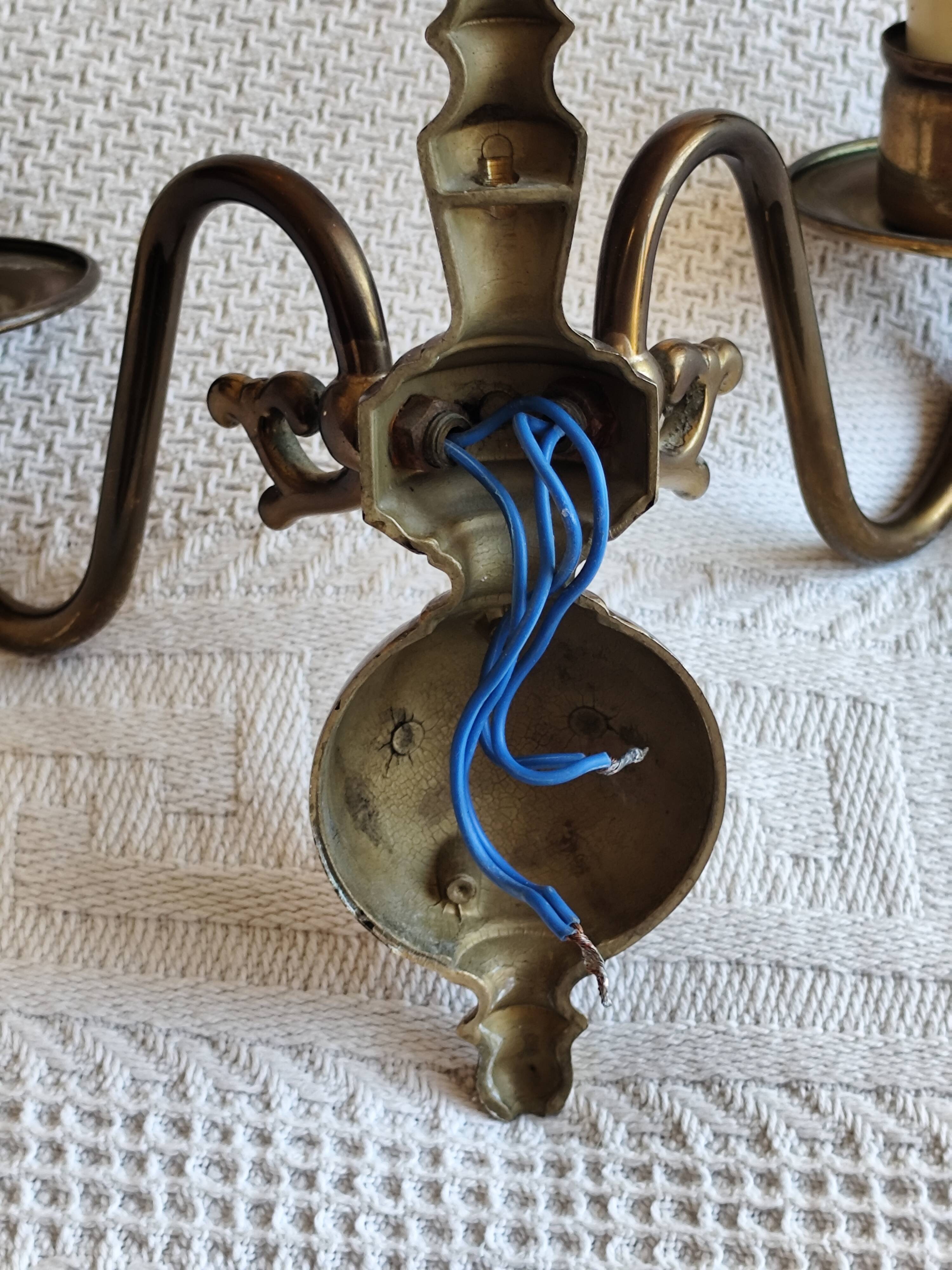 Pair of Dutch style 2-light brass wall lights