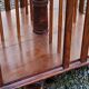 Art Deco style revolving bookcase in walnut and oak
