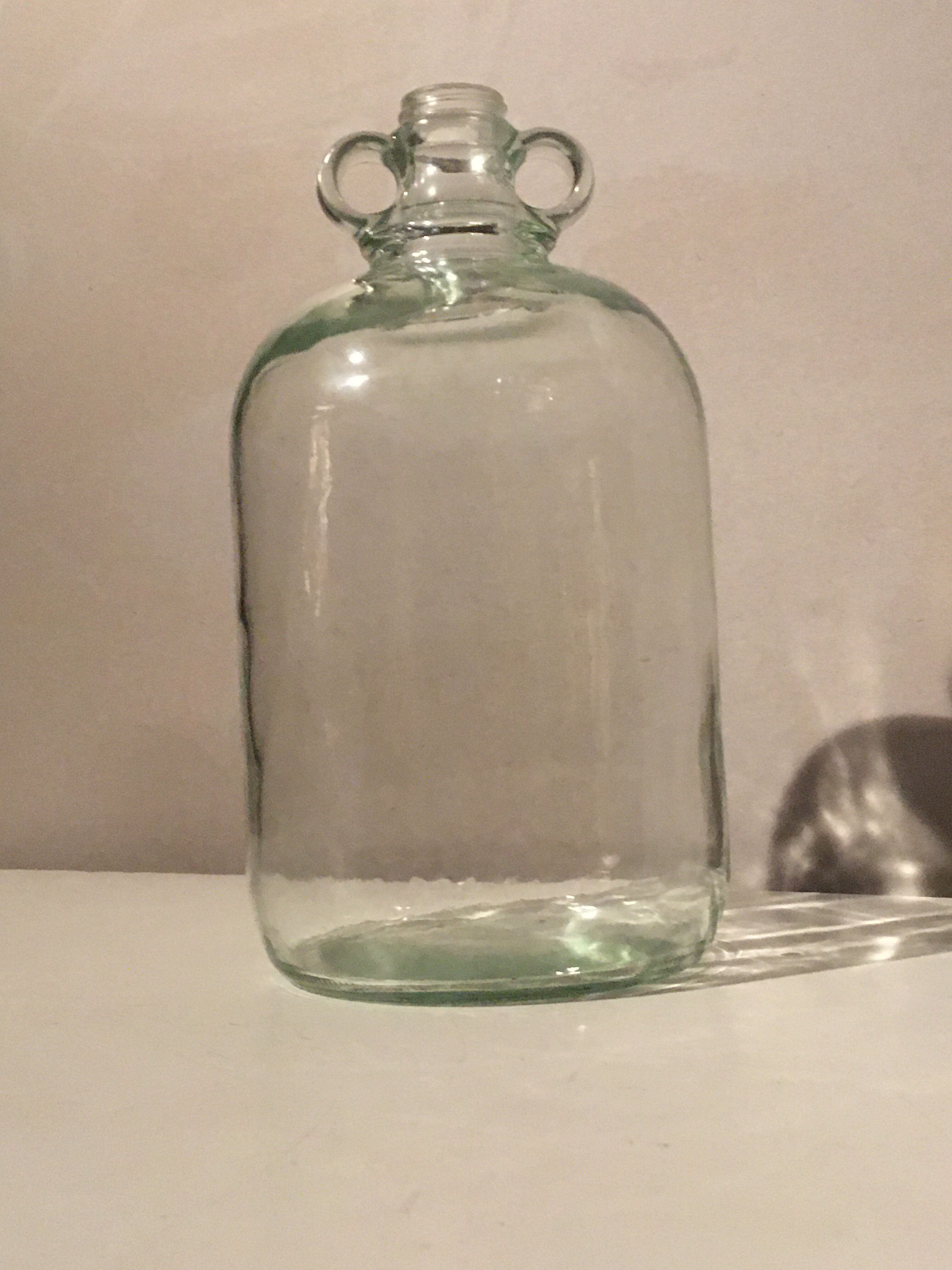 Demijohn in transparent glass