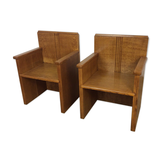 Pair of art deco solid oak chairs