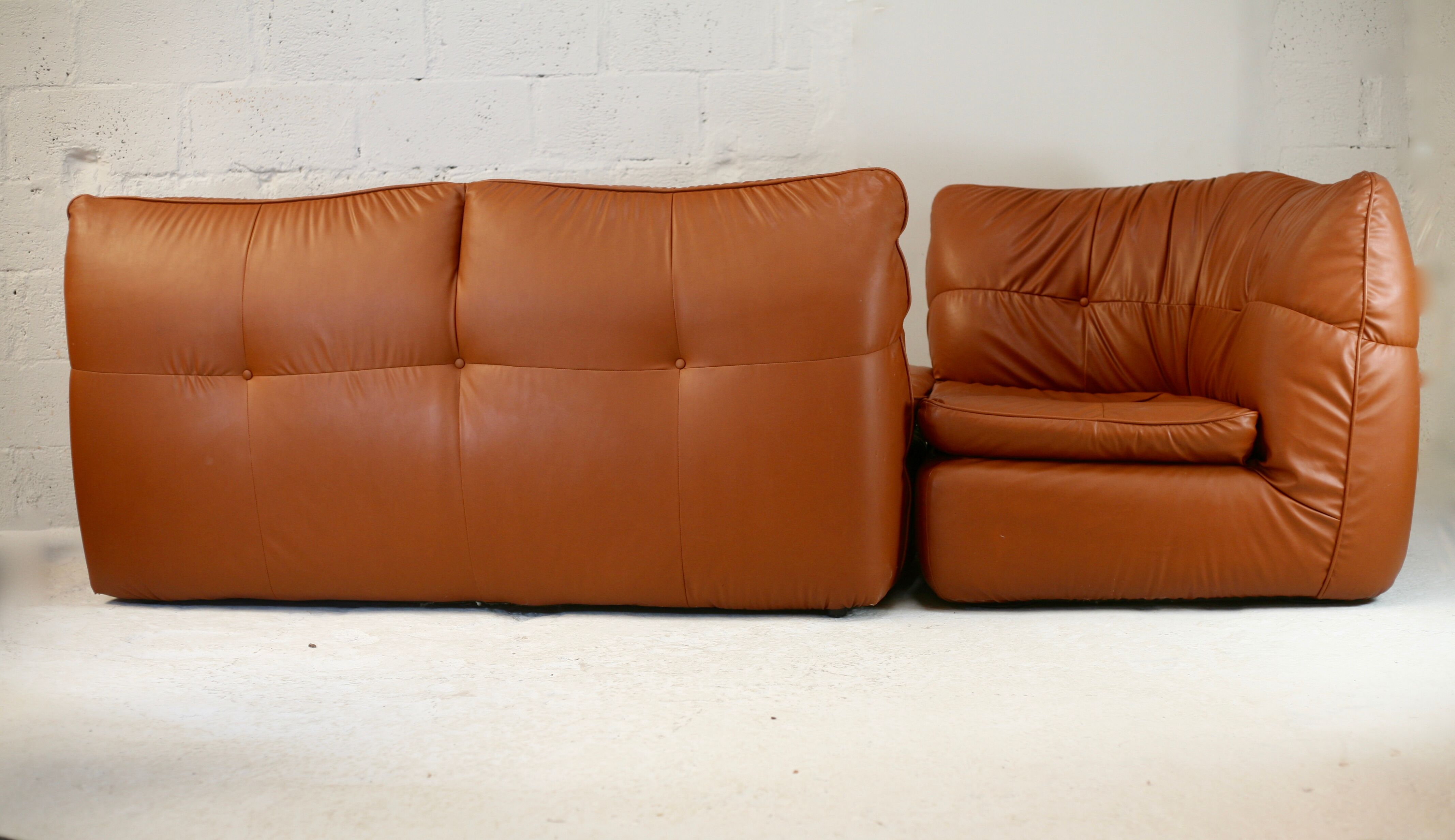 Imitation leather sofa "caramel". Convertible. France, circa 1990