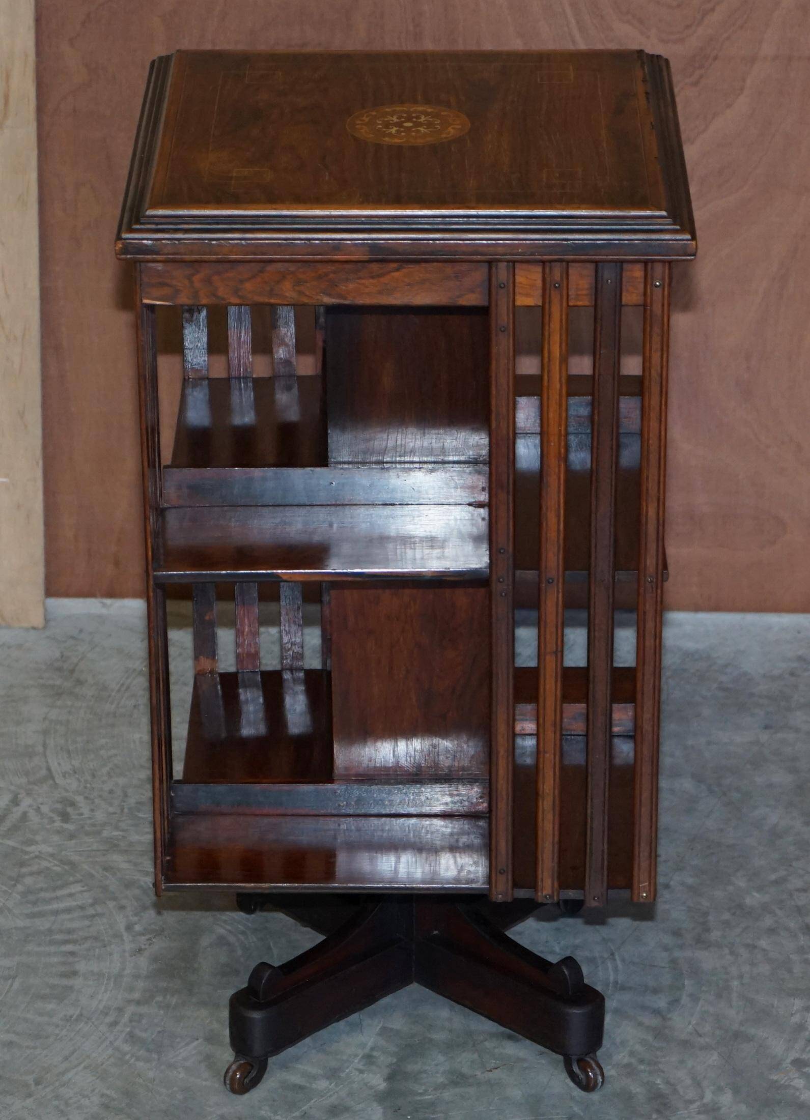 Edwardian revolving bookcase in hardwood with Sheraton inlay.