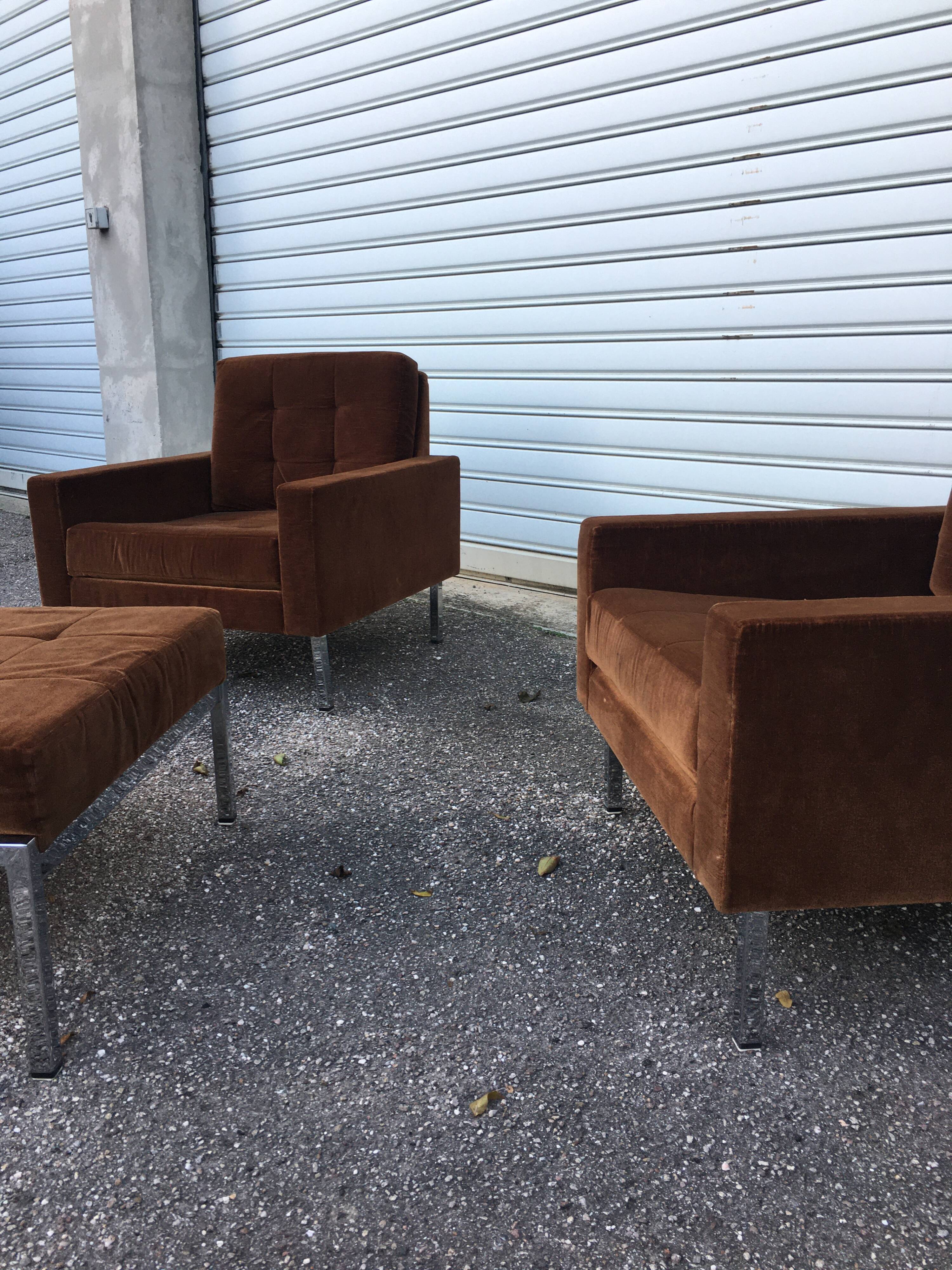 Pair of armchairs and his ottoman, circa 1970
