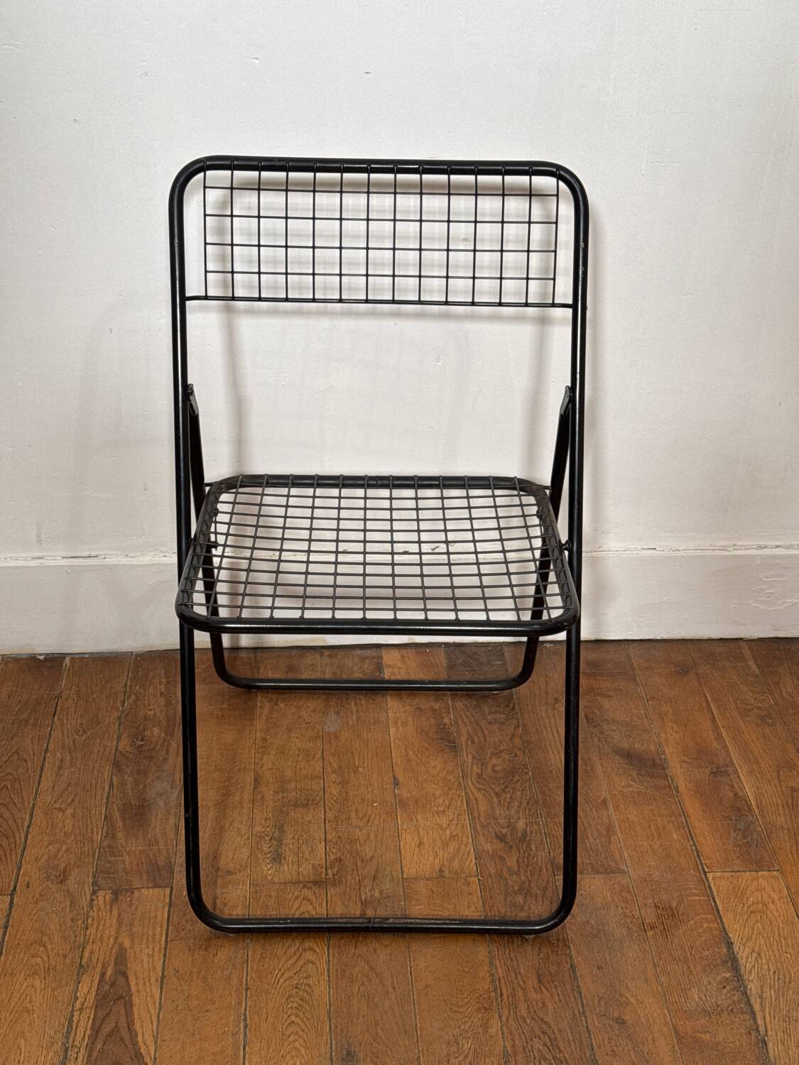 Black metal folding chair