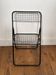 Black metal folding chair