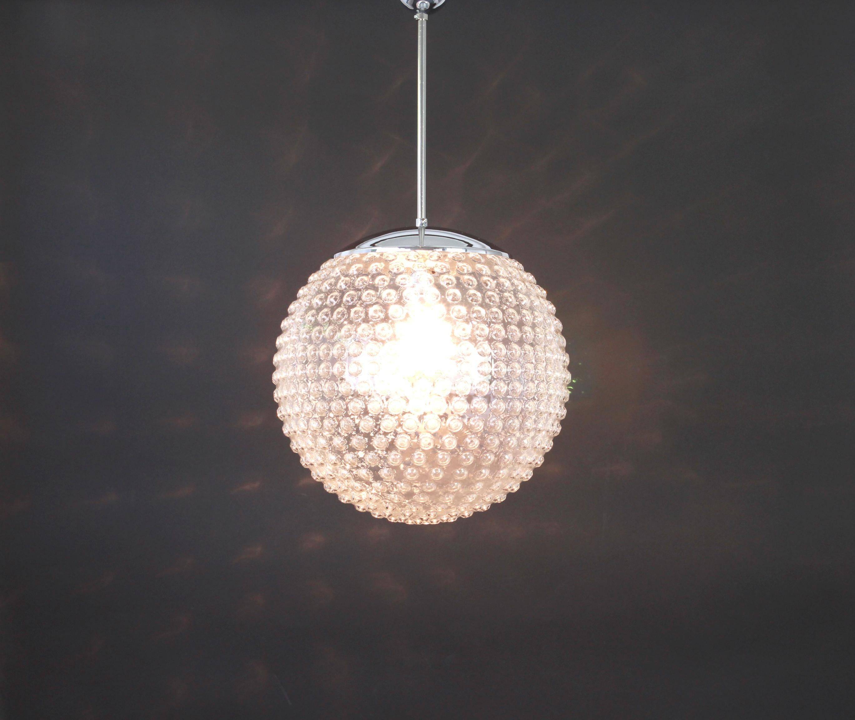 Rare glass pendant lamp designed by Rolf Krüger for Staff, Germany, 1970s.