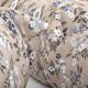 Togo lounge chair with pouf and 2-seater sofa in patterned fabric by Michel Ducaroy for Ligne Roset, set of 3