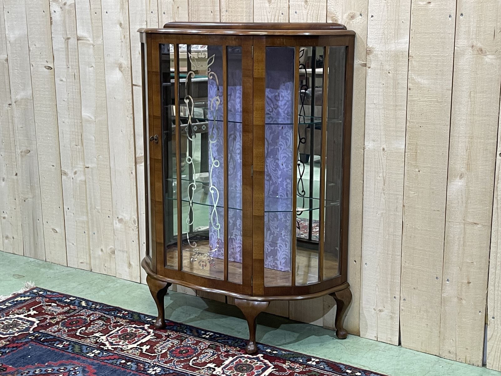 English walnut showcase from the 1930s