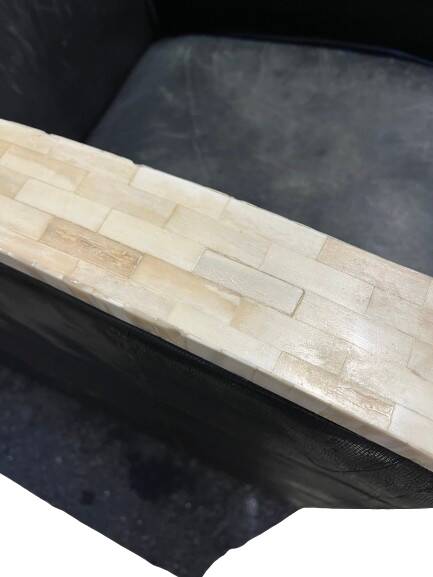 Pair of leather armchairs with marquetry armrests