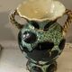 Pair of Vallauris vases in turquoise and black ceramic enhanced with o