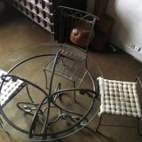 wrought iron table and 4 chairs