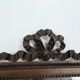 Louis XVI style mirror in carved walnut.