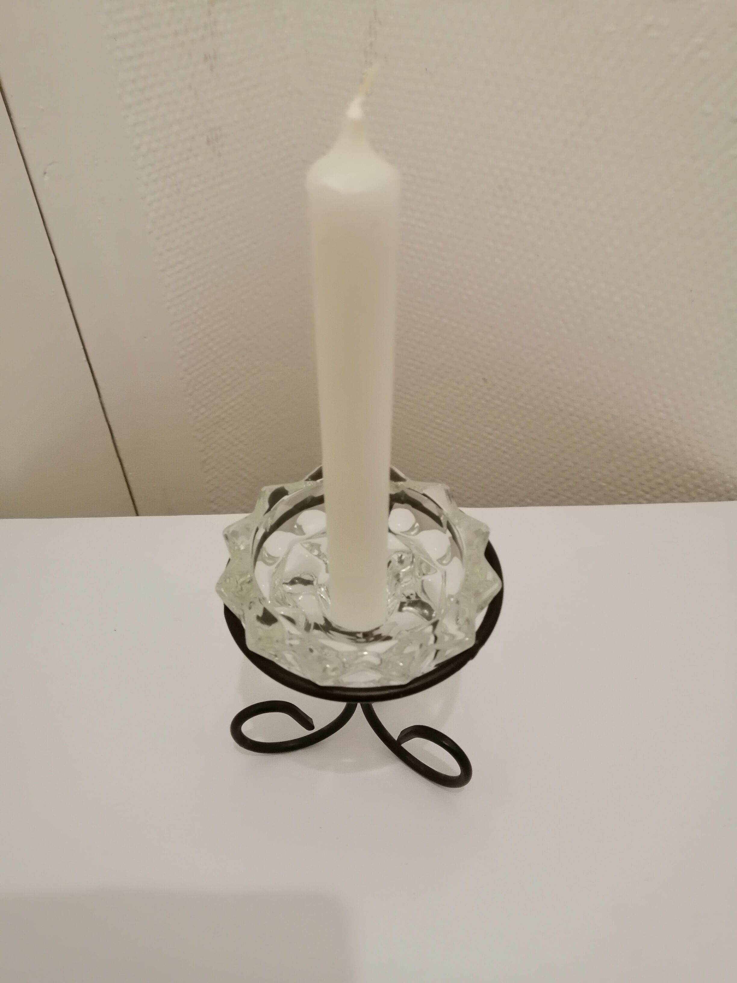 Metal base glass candle holder