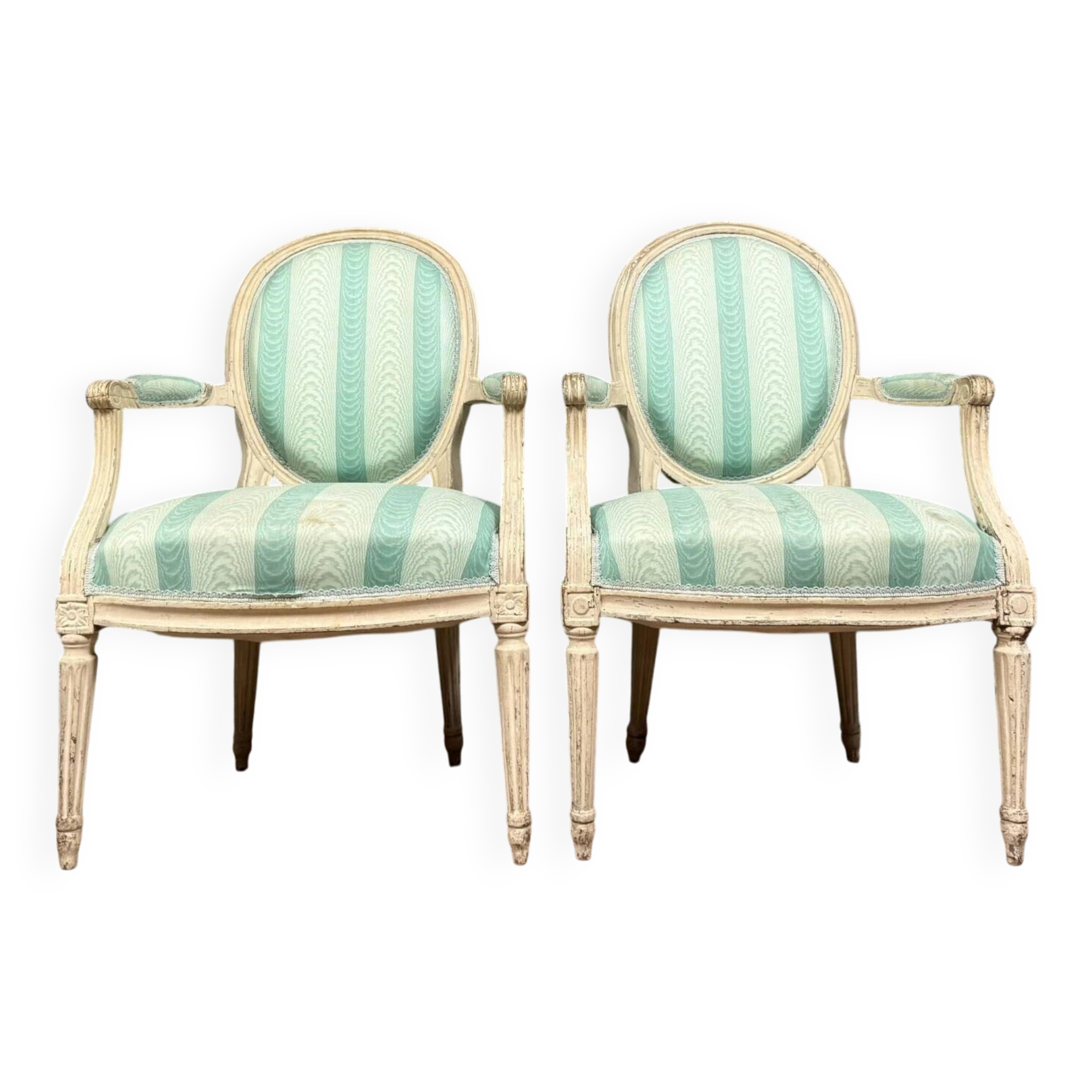 Pair of Louis XVI cabriolet armchairs in lacquered wood, 18th century