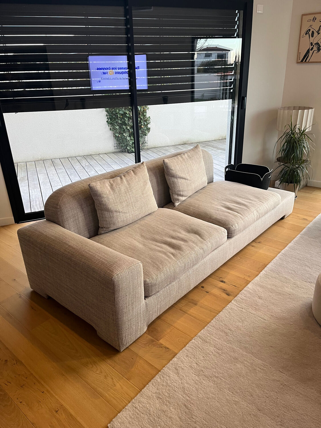 Three-seater fabric sofa