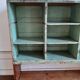 Old library shelf in patinated grocery tree