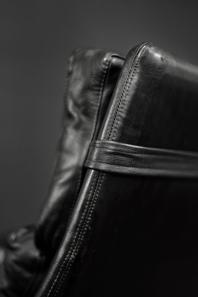 Mid-century danish modern minimalist black leather swivel armchair by georg thams, 1960s