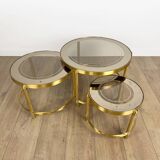 Vintage round nesting tables in gilded bronze with smoked glass