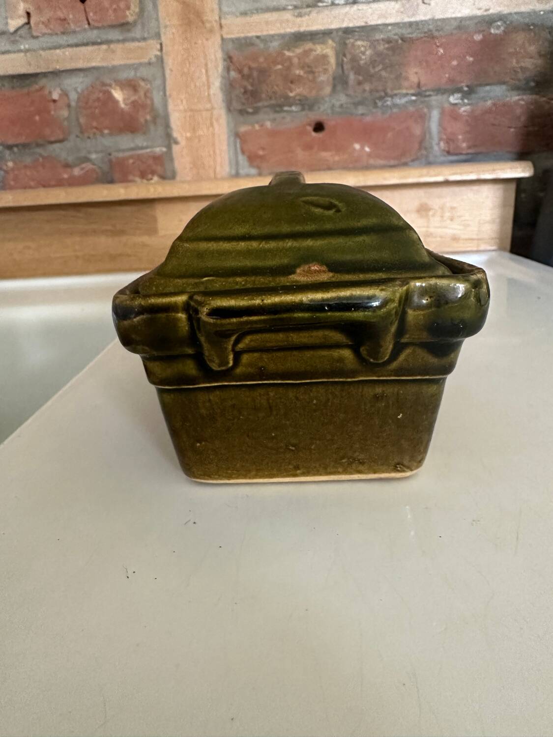 Vintage green majolica butter dish