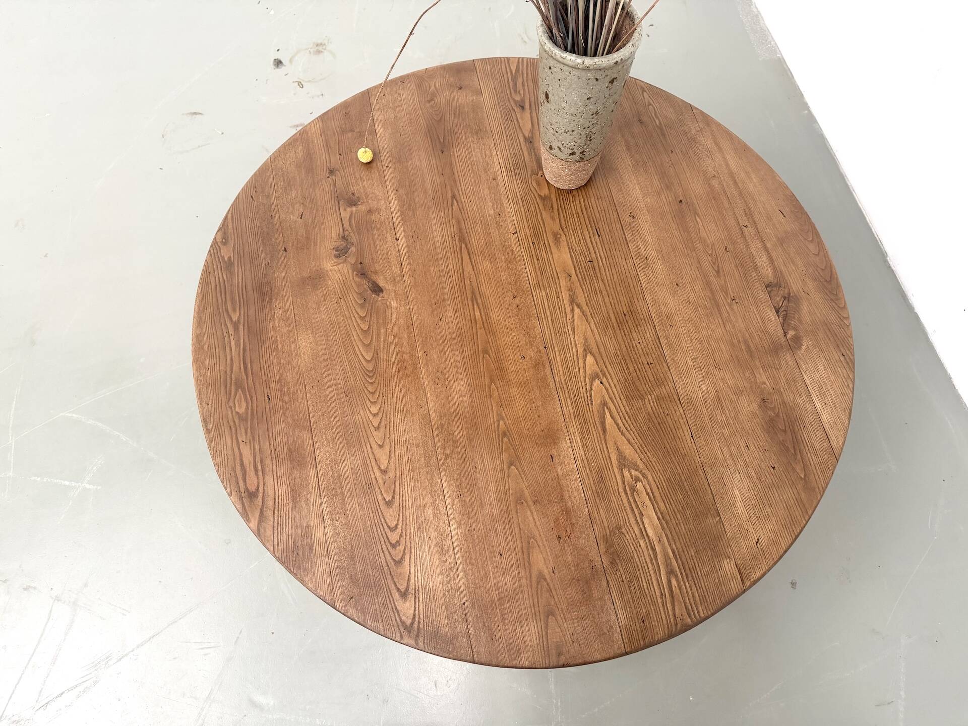 Round coffee table in solid oak, octagonal legs, France, 1950s.