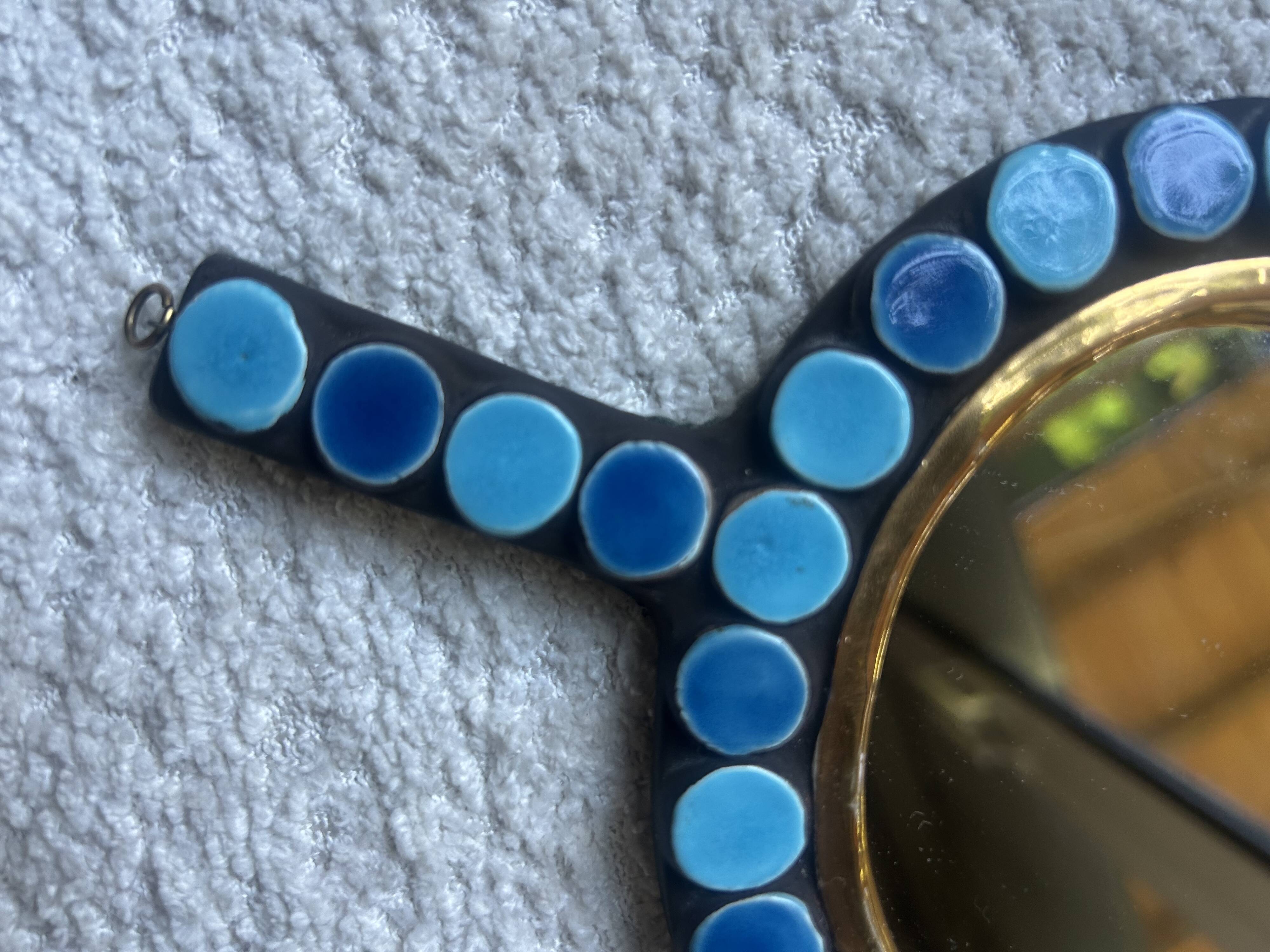 Mithé Espelt handheld mirror