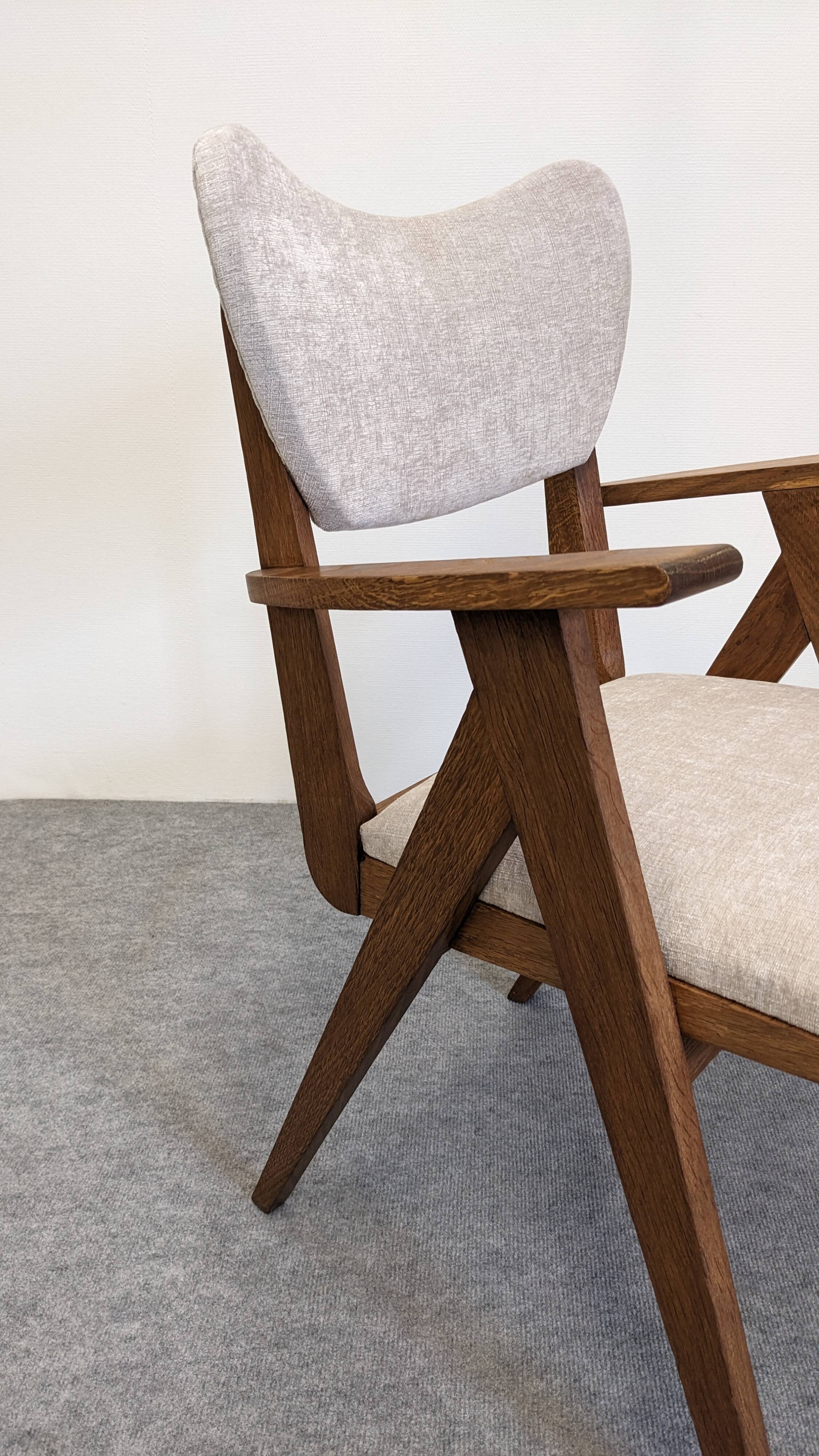 Pair of Scandinavian bridge armchairs in teak, Denmark circa 1950.