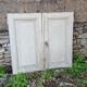 Pair of old white painted fir closet doors