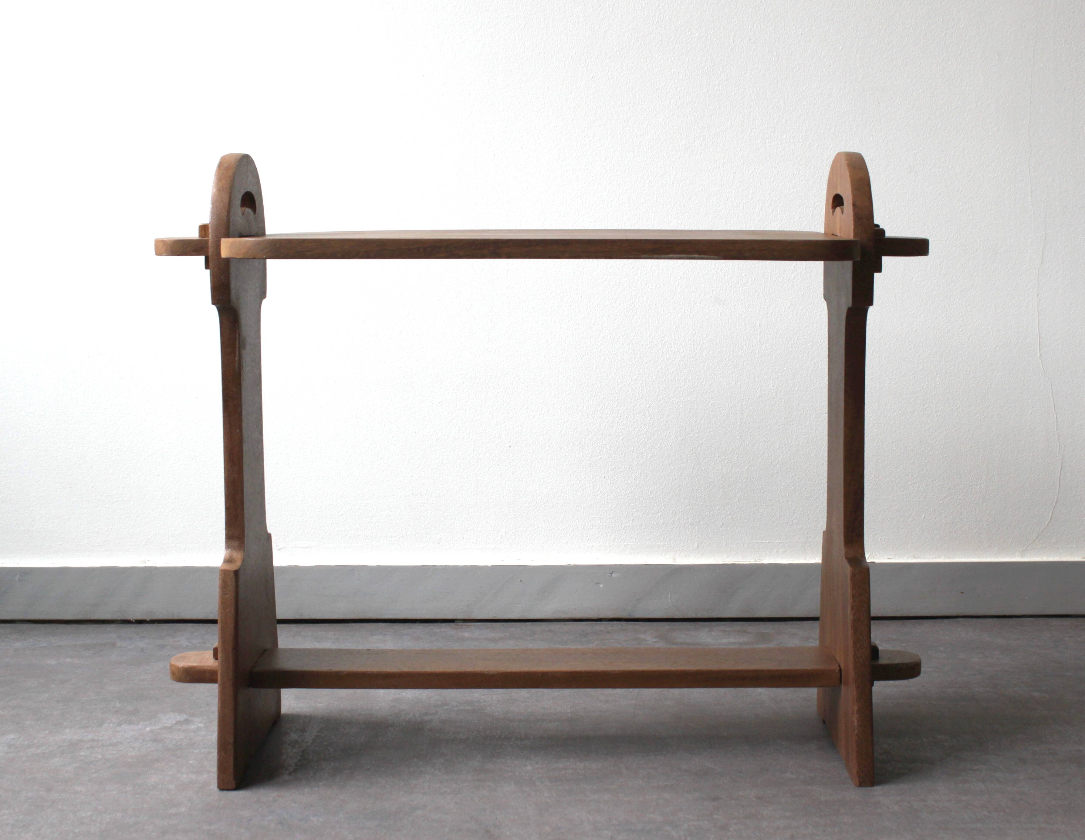 Brutalist side table in exotic wood, 50s.