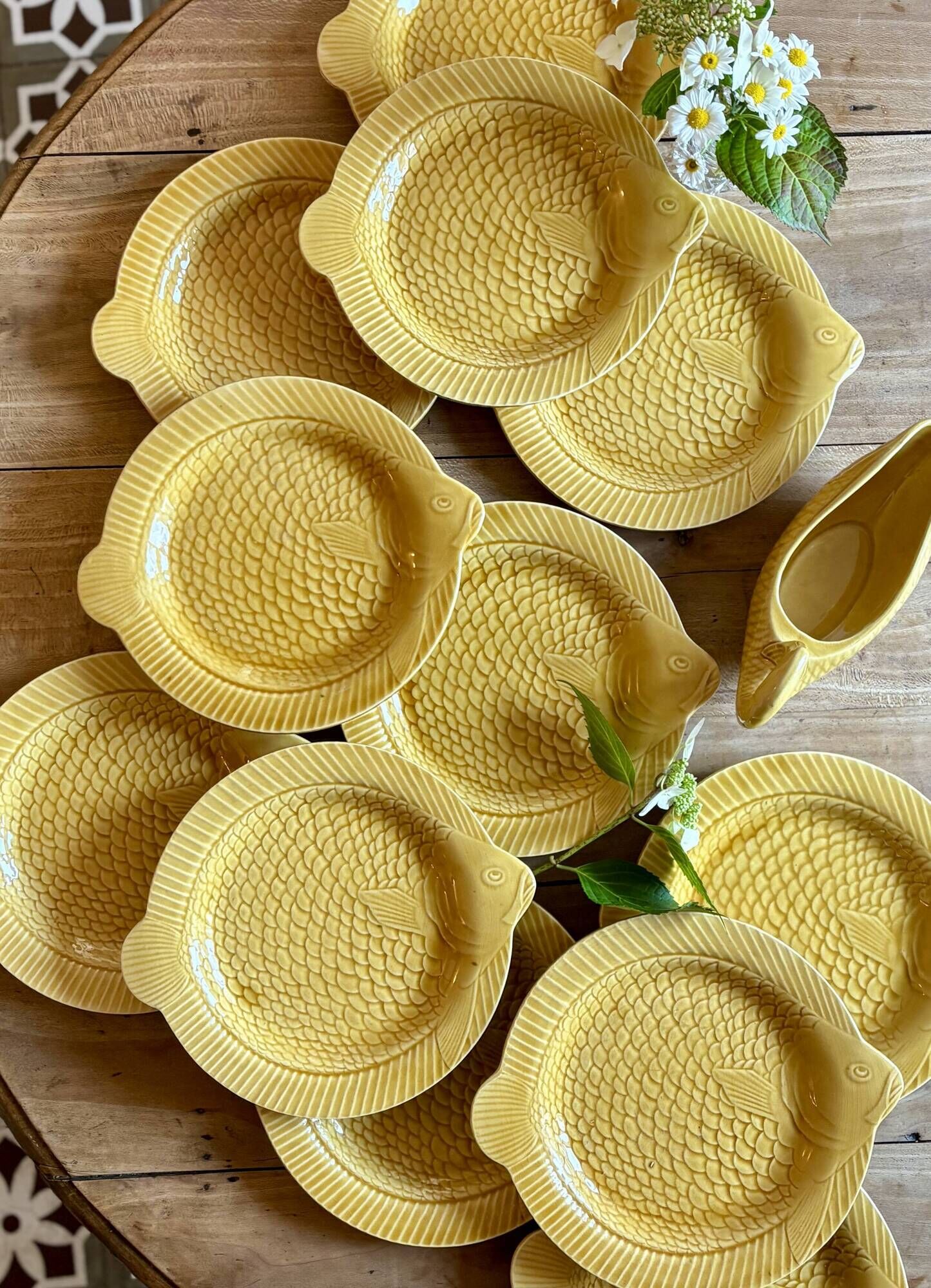 Set of 11 vintage Sarreguemines fish plates and sauceboat