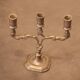 Small three-armed candlestick in pewter.