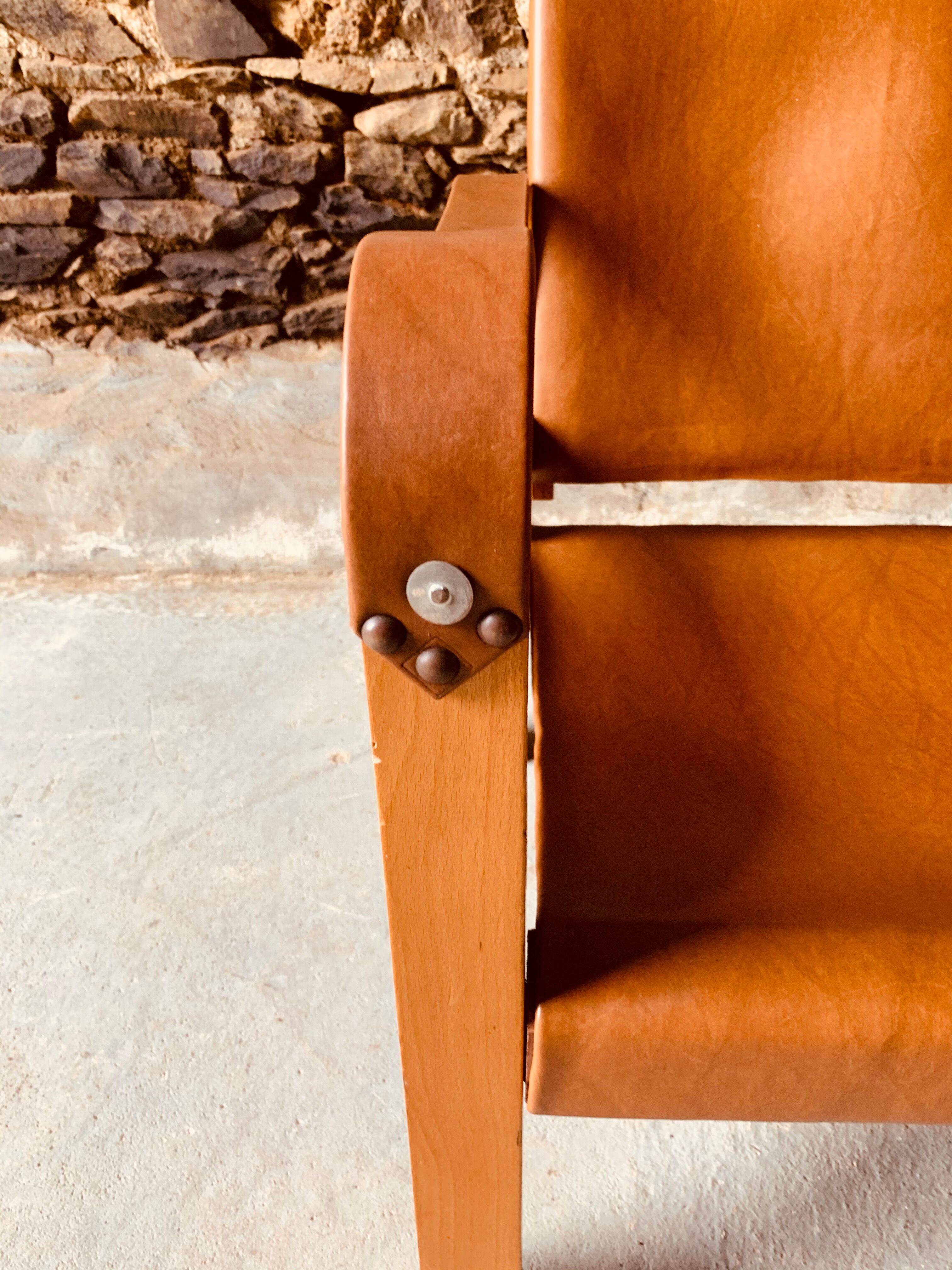 Safari armchair in wood and leather -1950's