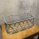 Gray wrought iron shelf
