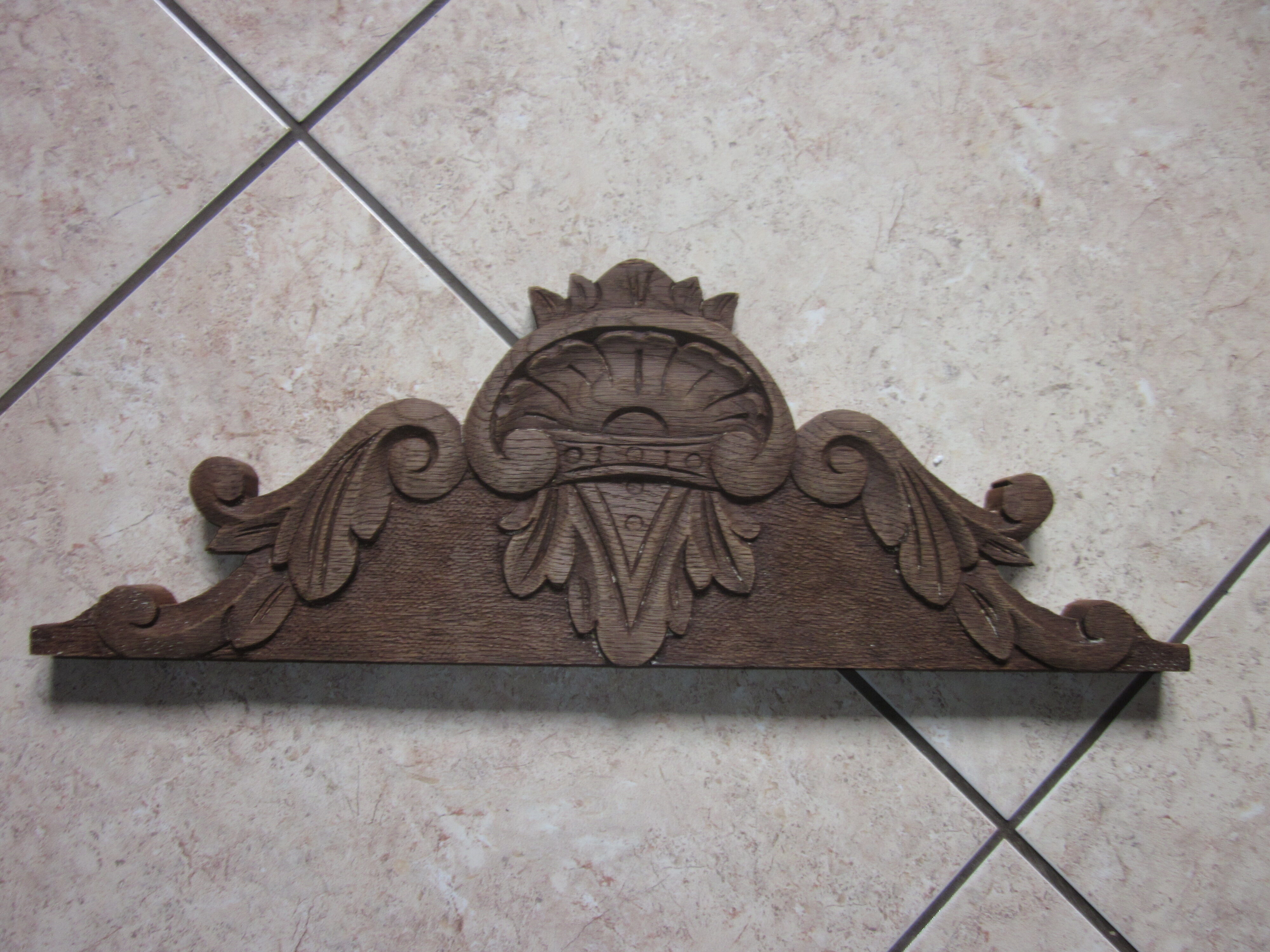 Old pediment in chene