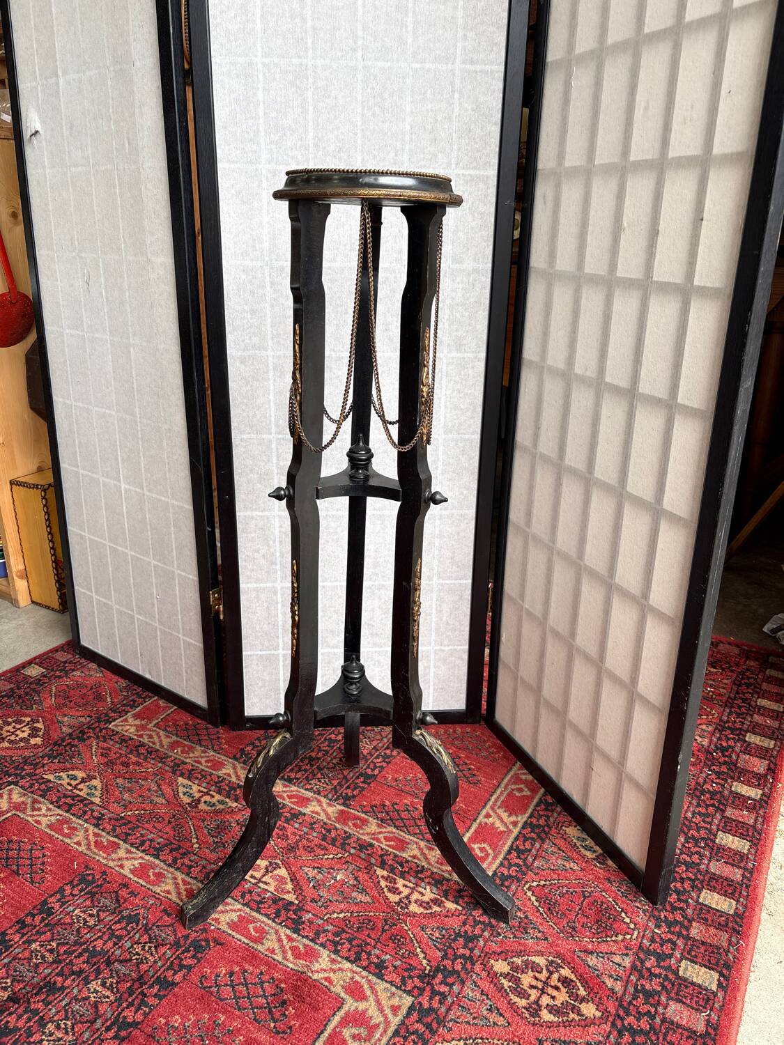 Napoleon III side table in blackened wood and bronze, decorated with chains, 19th century.