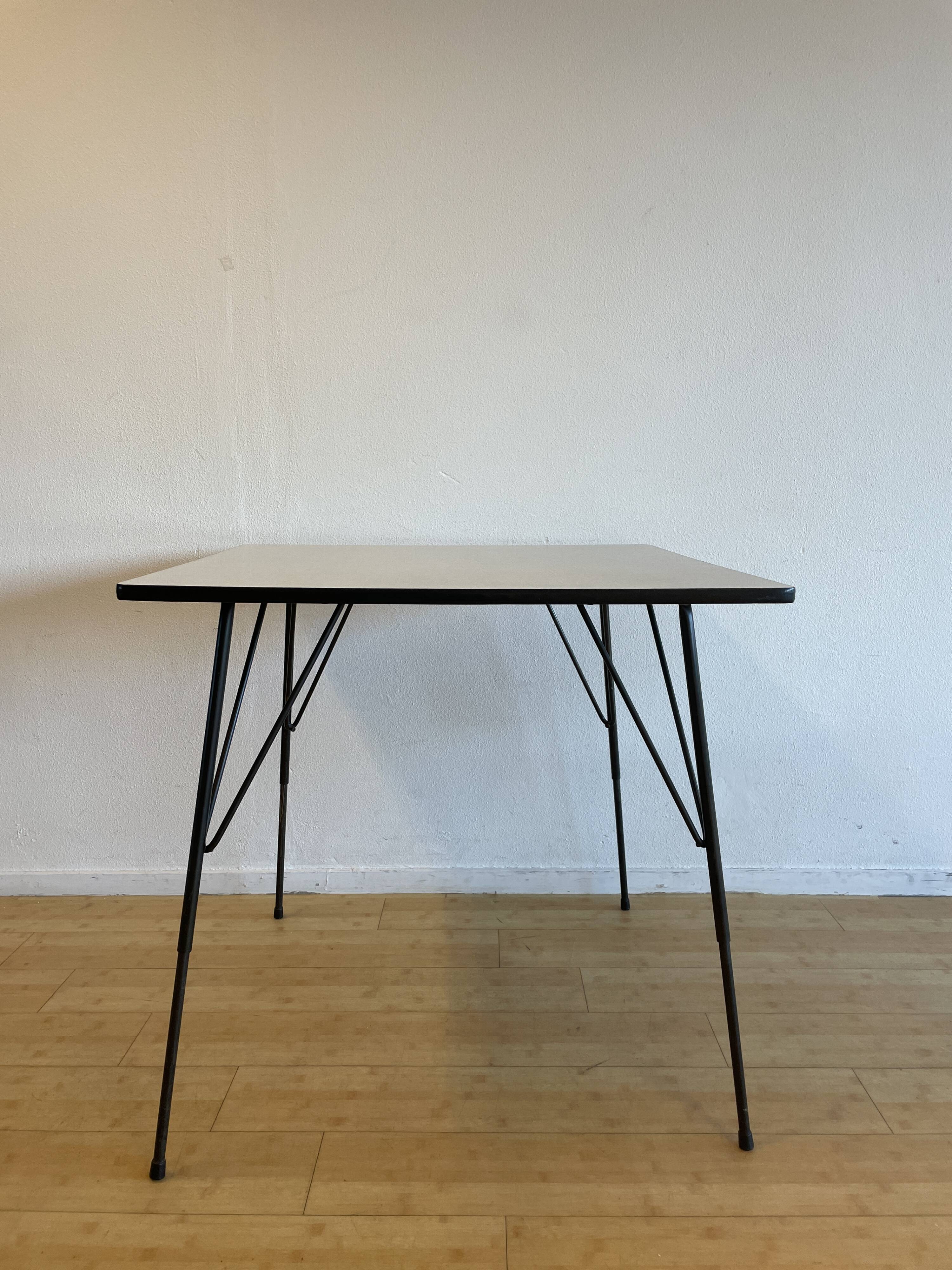 Gray height-adjusted coffee / dining room table, by Rudolf Wolf for Elsrijk