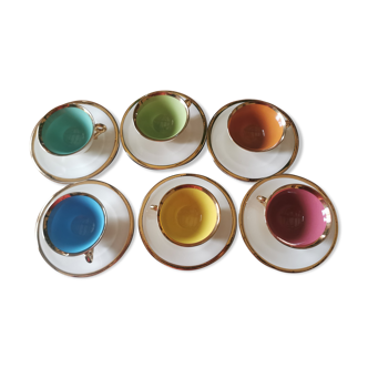 Ensemble de tasses à cafe et soucoupes en faience de Salins