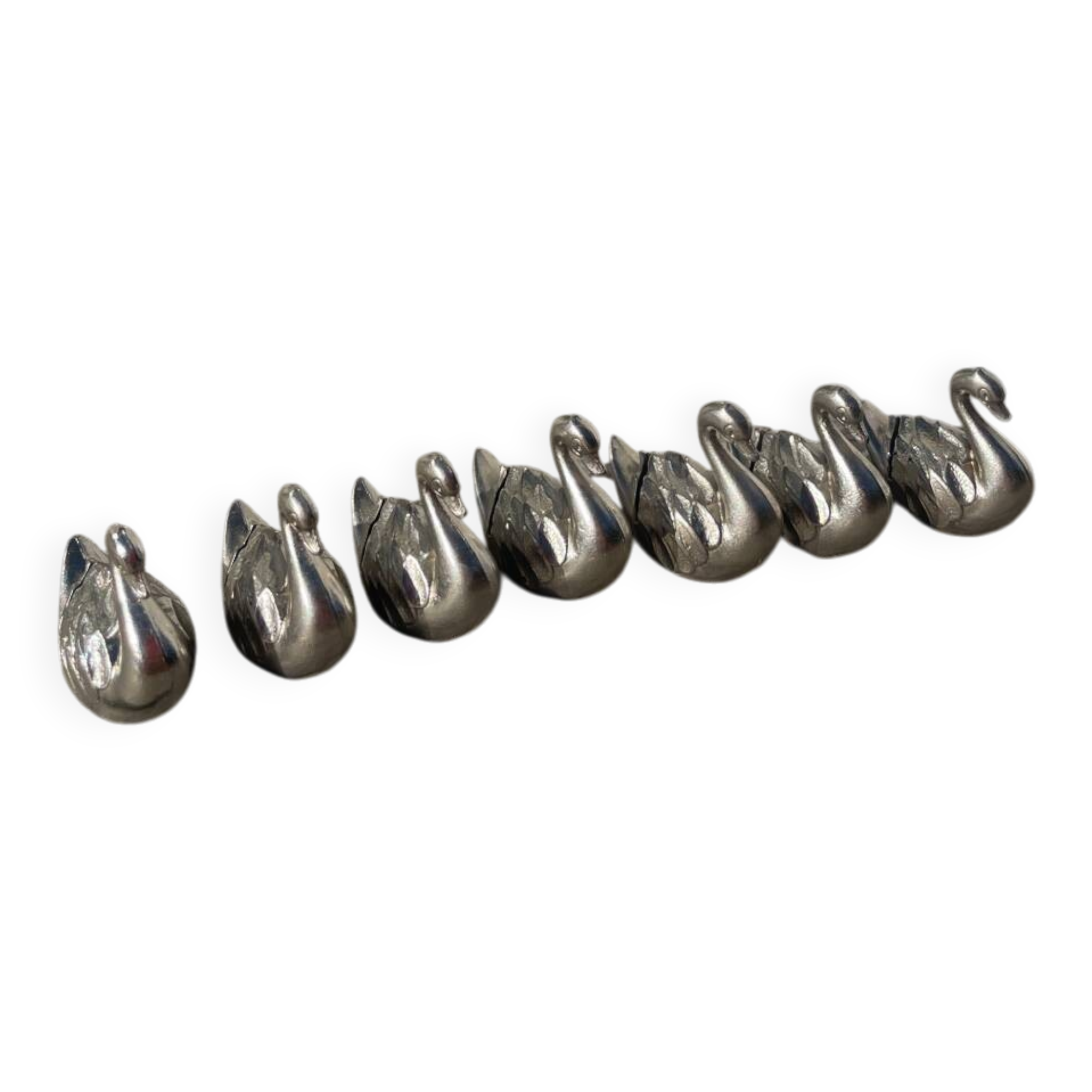 7 silver-plated metal swan name tags