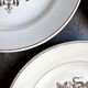 4 Longchamp brown earthenware dinner plates, "Tarente" service